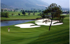 golfer playing at hanoi golf club, hanoi, vietnam